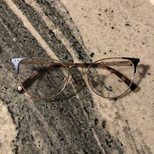 Black and gold glasses